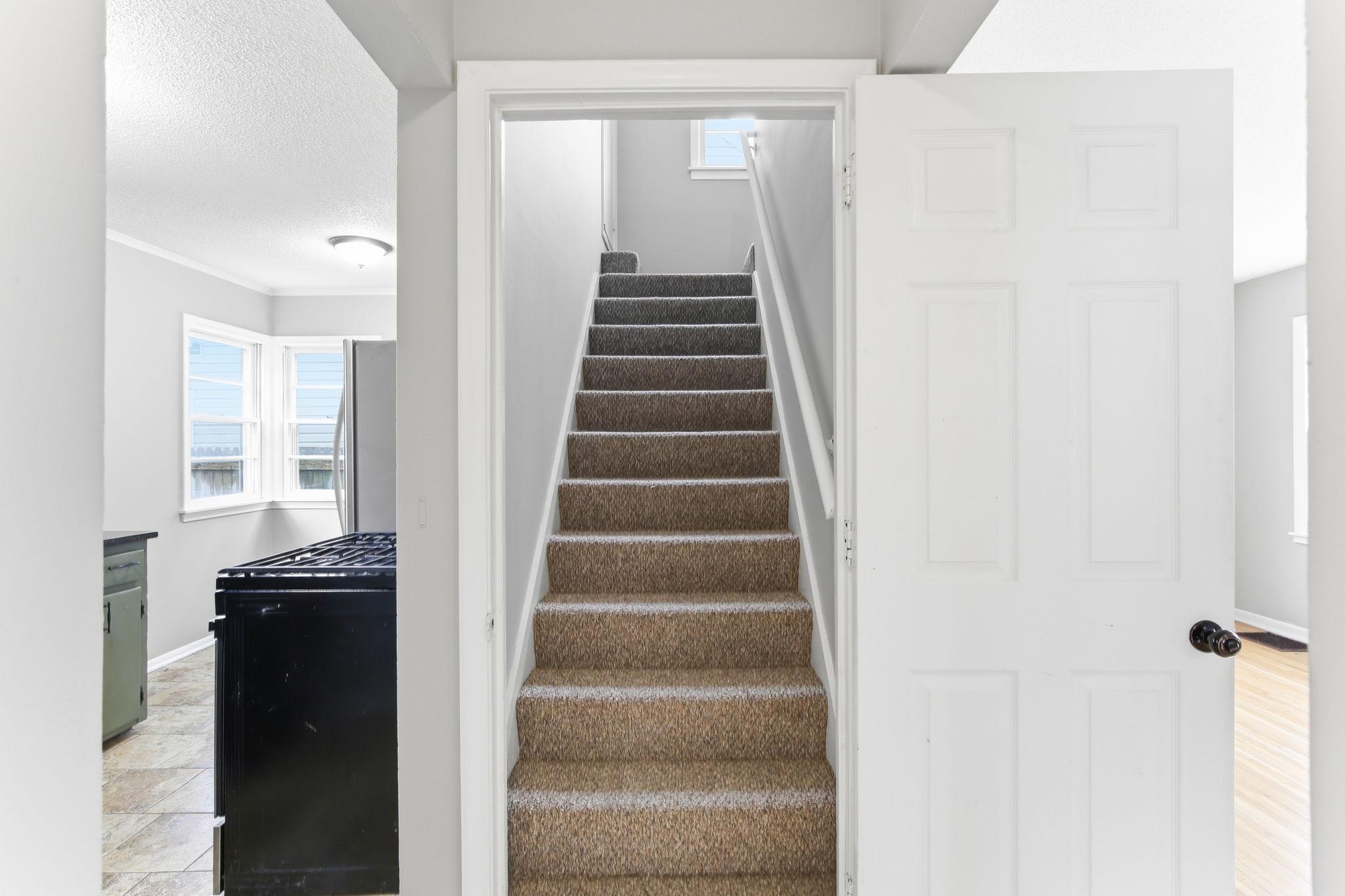 Staircase leading to upstairs bedroom