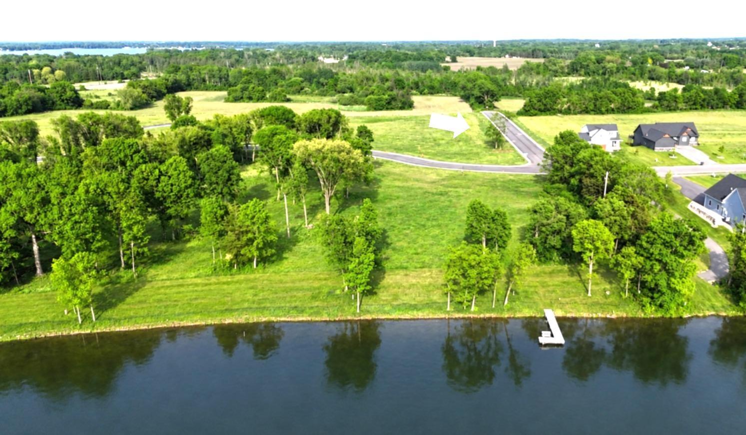 LOT 25 is an oversized .42 acre lot just steps away from Lake John and the lakeside green space.