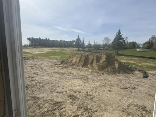 (Photo is of the actual backyard in progress.)