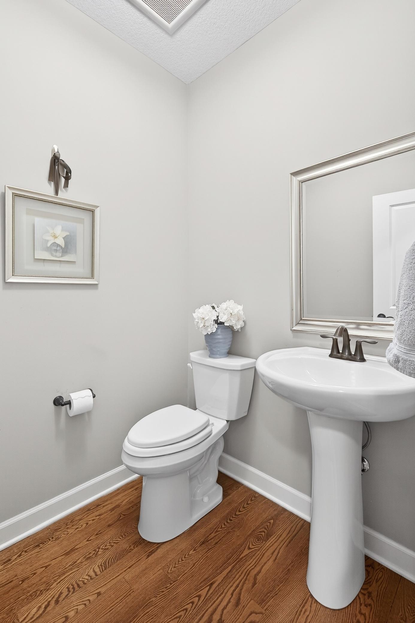 Main floor powder room for guests...
