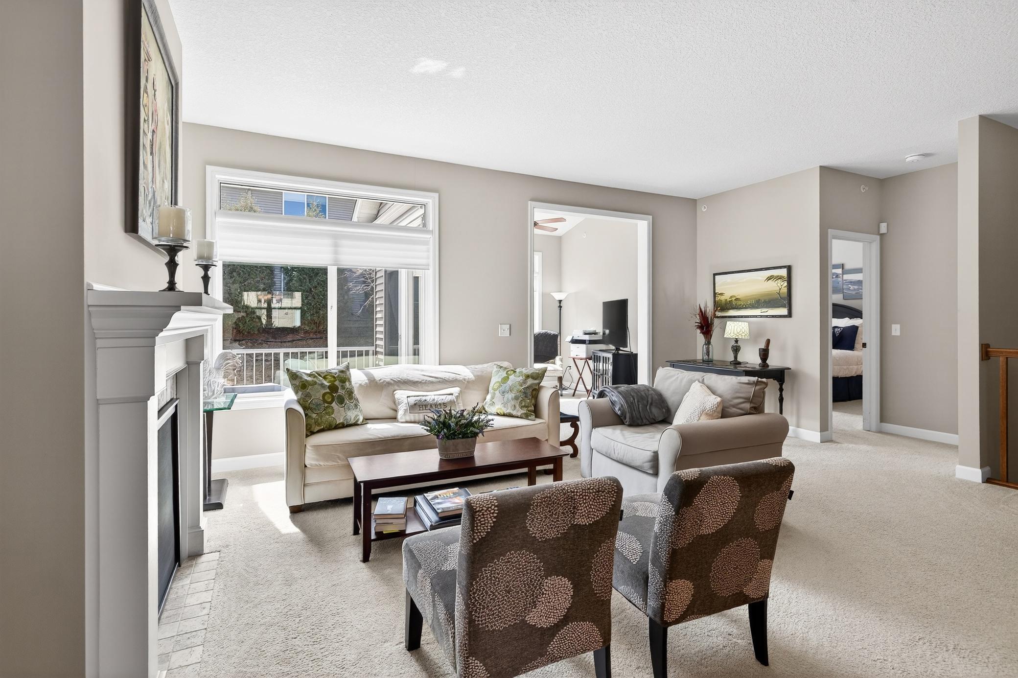 Windows in LR, Sunroom and bedroom have beautiful Hunter Douglas motorized blinds...