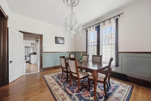 Vast dinning room with wood trim throughout