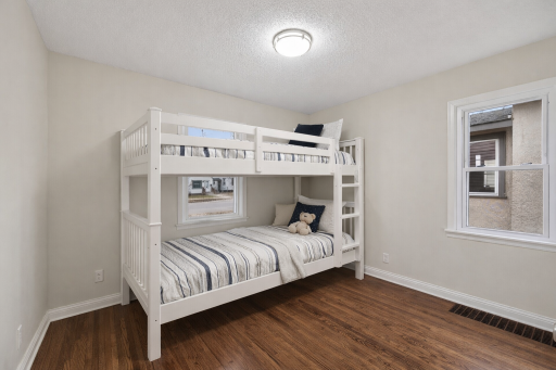 This bedroom photo has been virtually staged.
