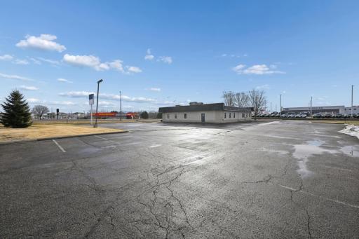 Full view of the parking lot and building.