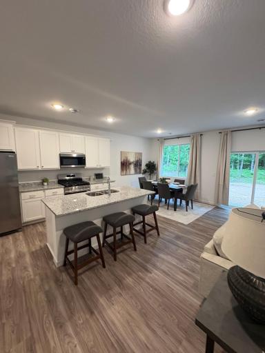 Open floor plan with lots of natural lighting