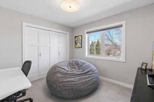 The third bedroom upstairs is currently used as a flex room but offers a size comparable to the other bedrooms.