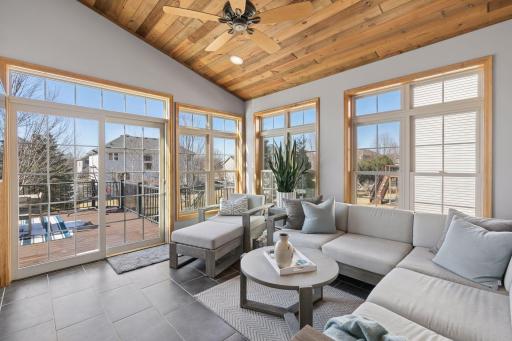 Youâll love enjoying coffee in your sunny 4-season porchâa unique, custom space that truly sets this home apart. The porch also leads to the deck.