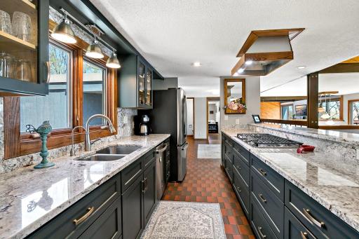 Totally remodeled kitchen with custom cabinets, granite countertops and stainless steel appliances.