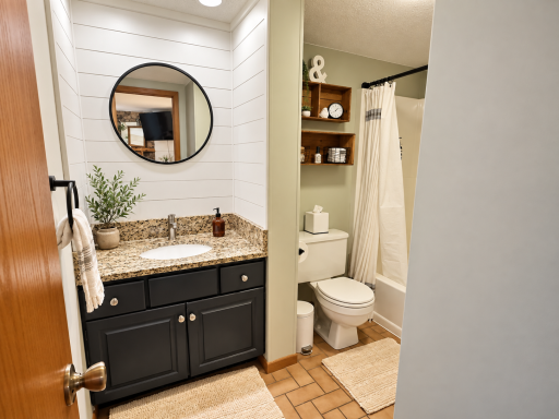 Full bath with stocked shampoo conditioner and body wash.png