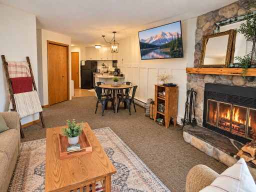 Open concept living area off of kitchen and bedroom.png