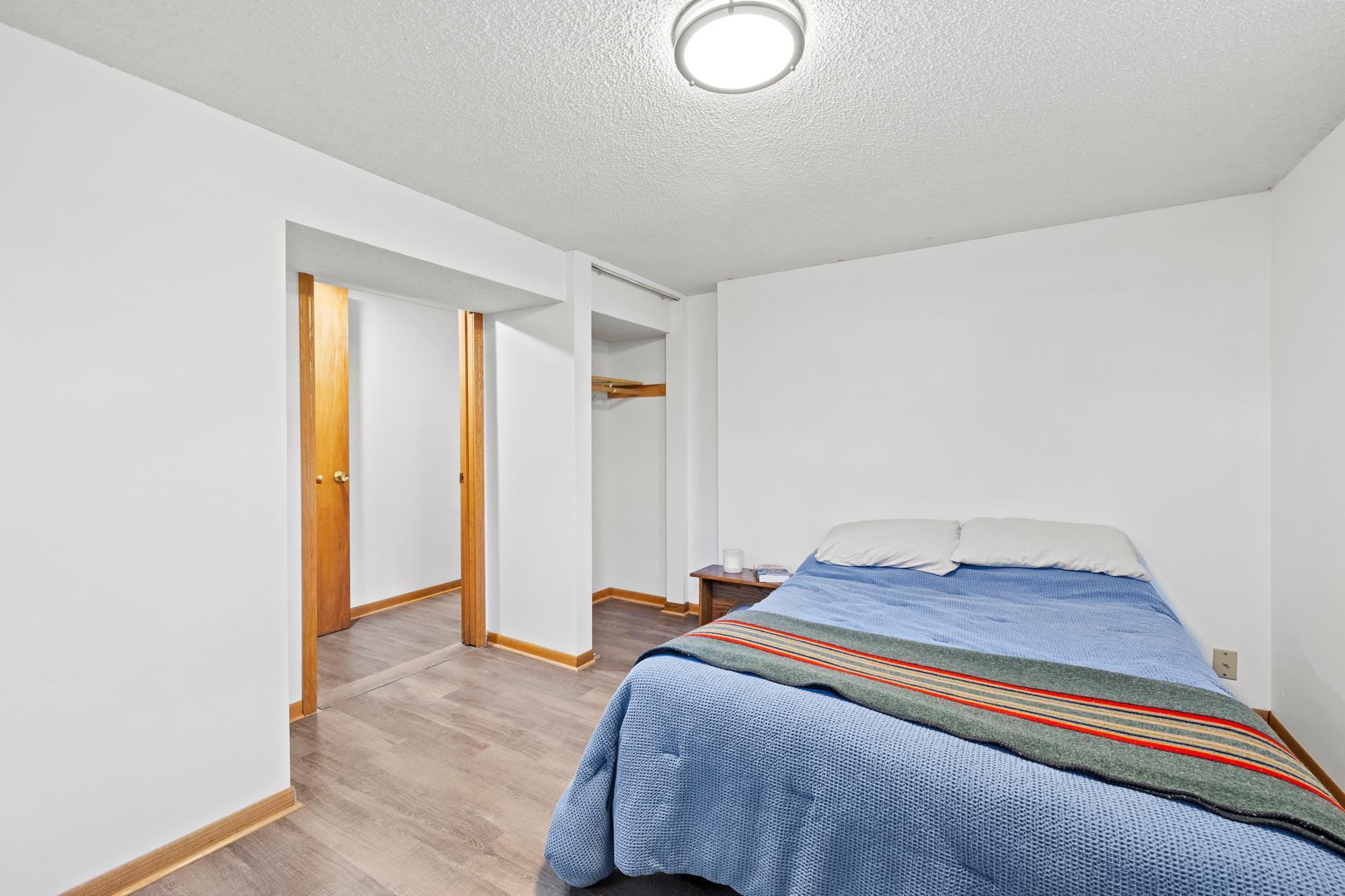 Basement bedroom, or the perfect for guests, or a mother-in-law suite, along with the basement bathroom and kitchenette