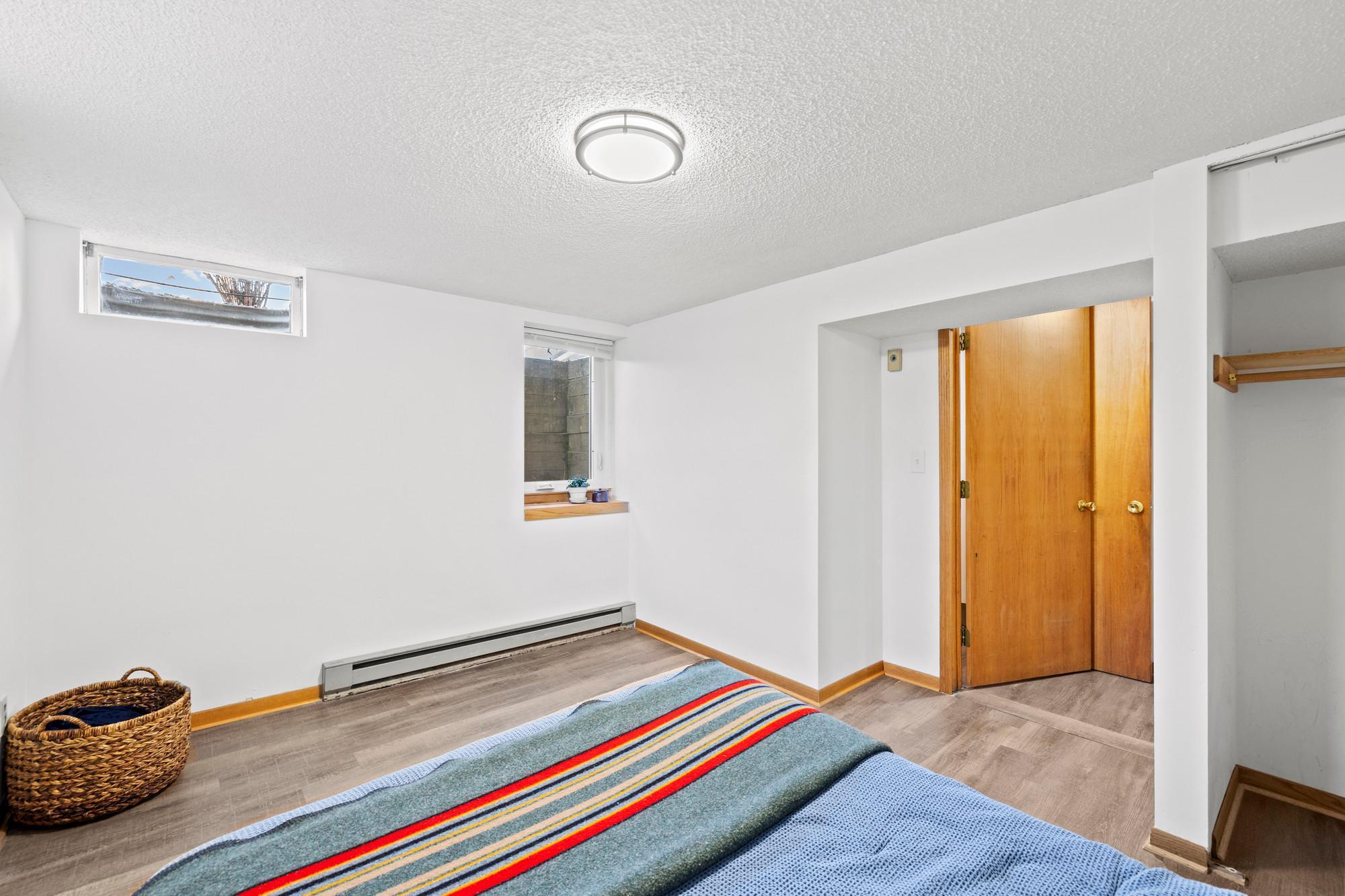 Basement bedroom, or the perfect for guests, or a mother-in-law suite, along with the basement bathroom and kitchenette