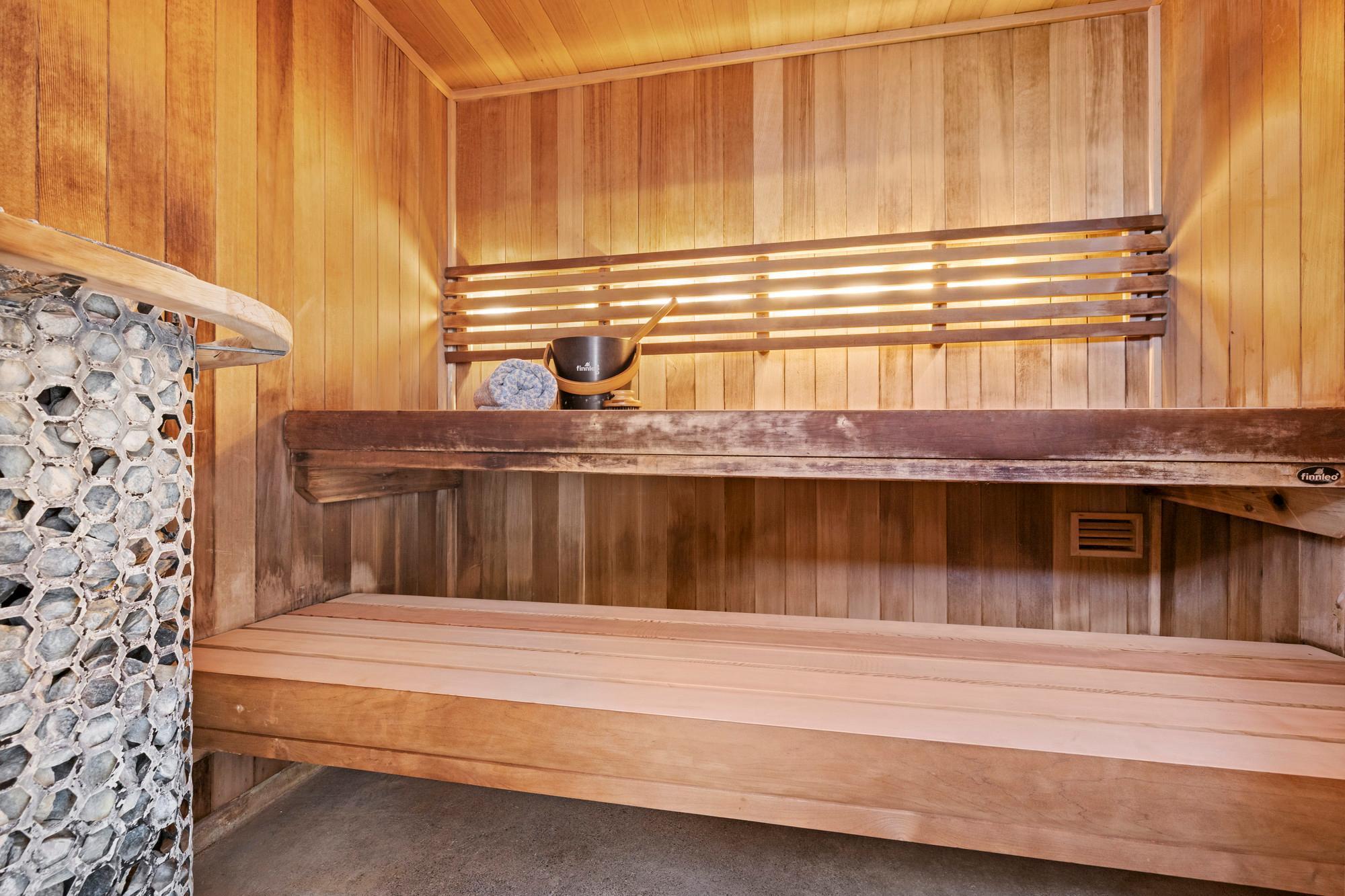 Custom Finnleo Sauna with relaxing lighting and mobile app control - this hot sauna will welcome you home on a chilly day