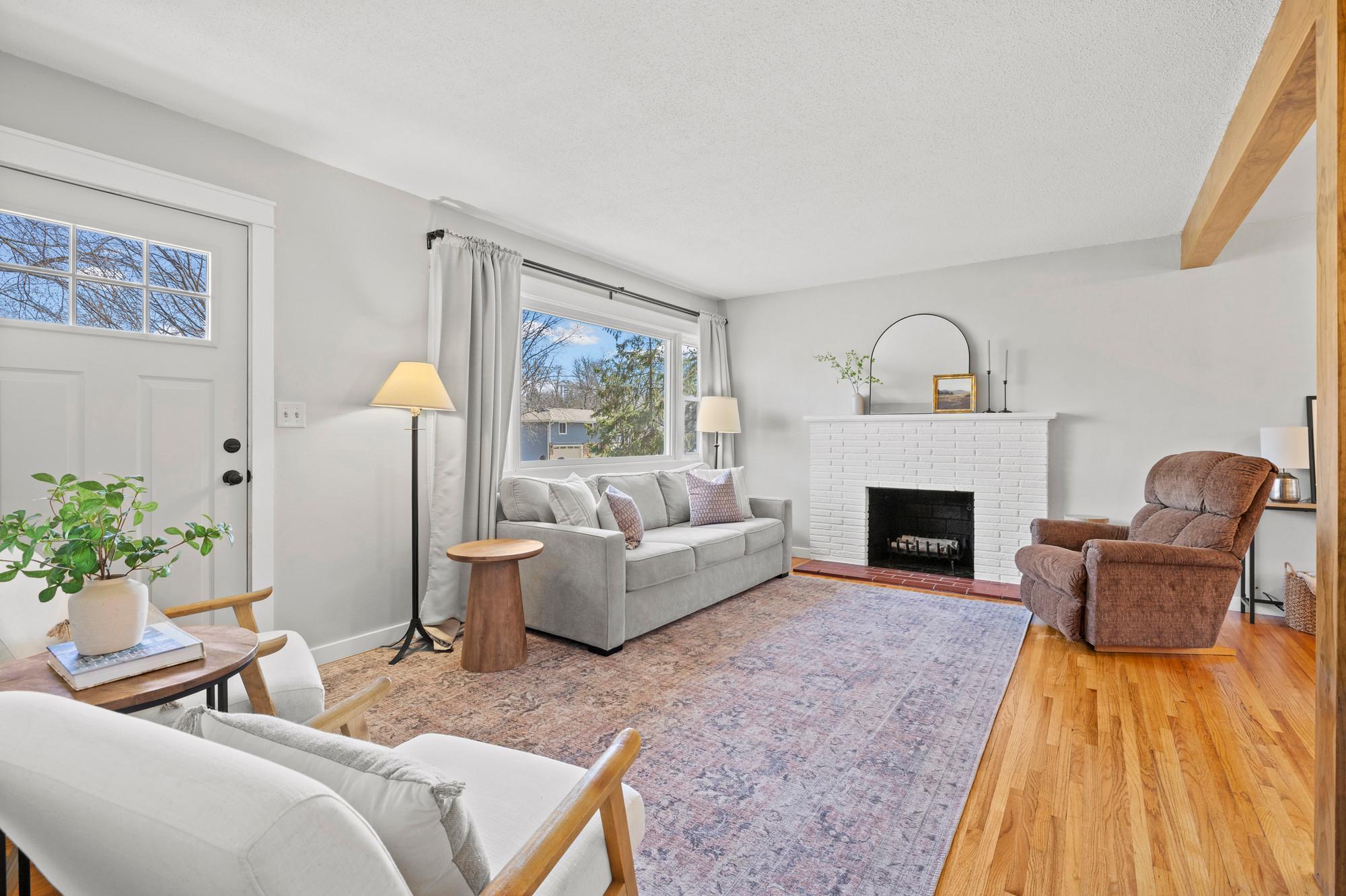 Wonderful picture window and fireplace in the living room