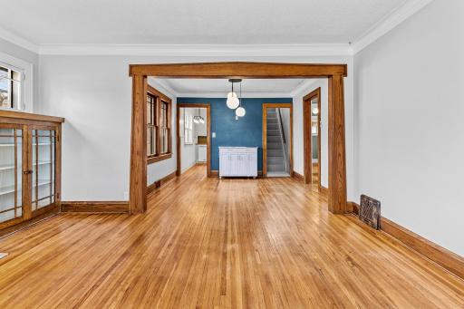 Living room/dining room with original wood floors.jpg