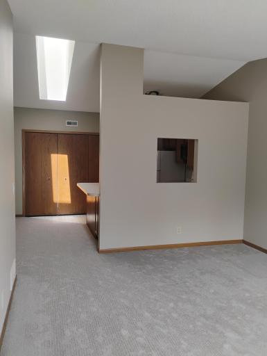 Looking to kitchen from Living Room showing skylight