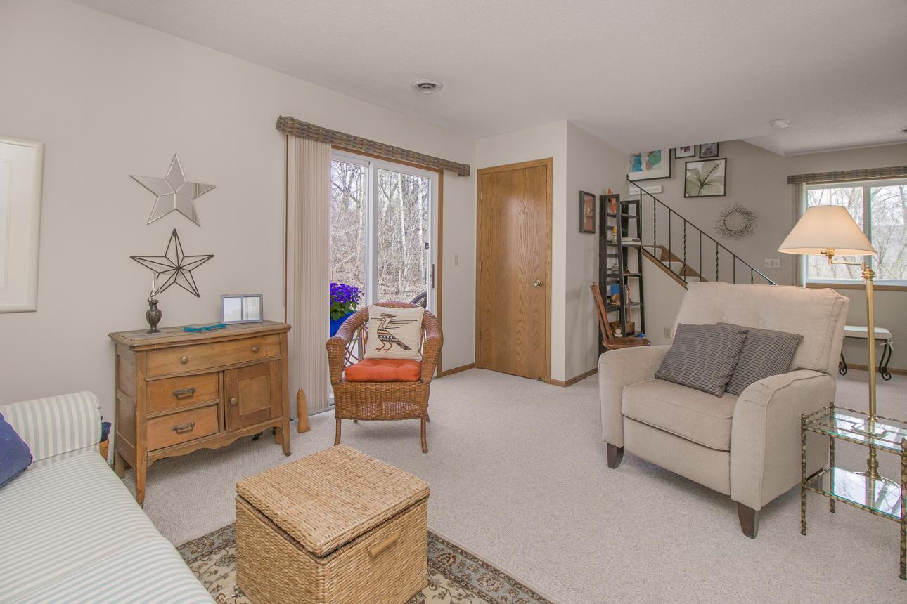 Family room walkout to patio with nature views