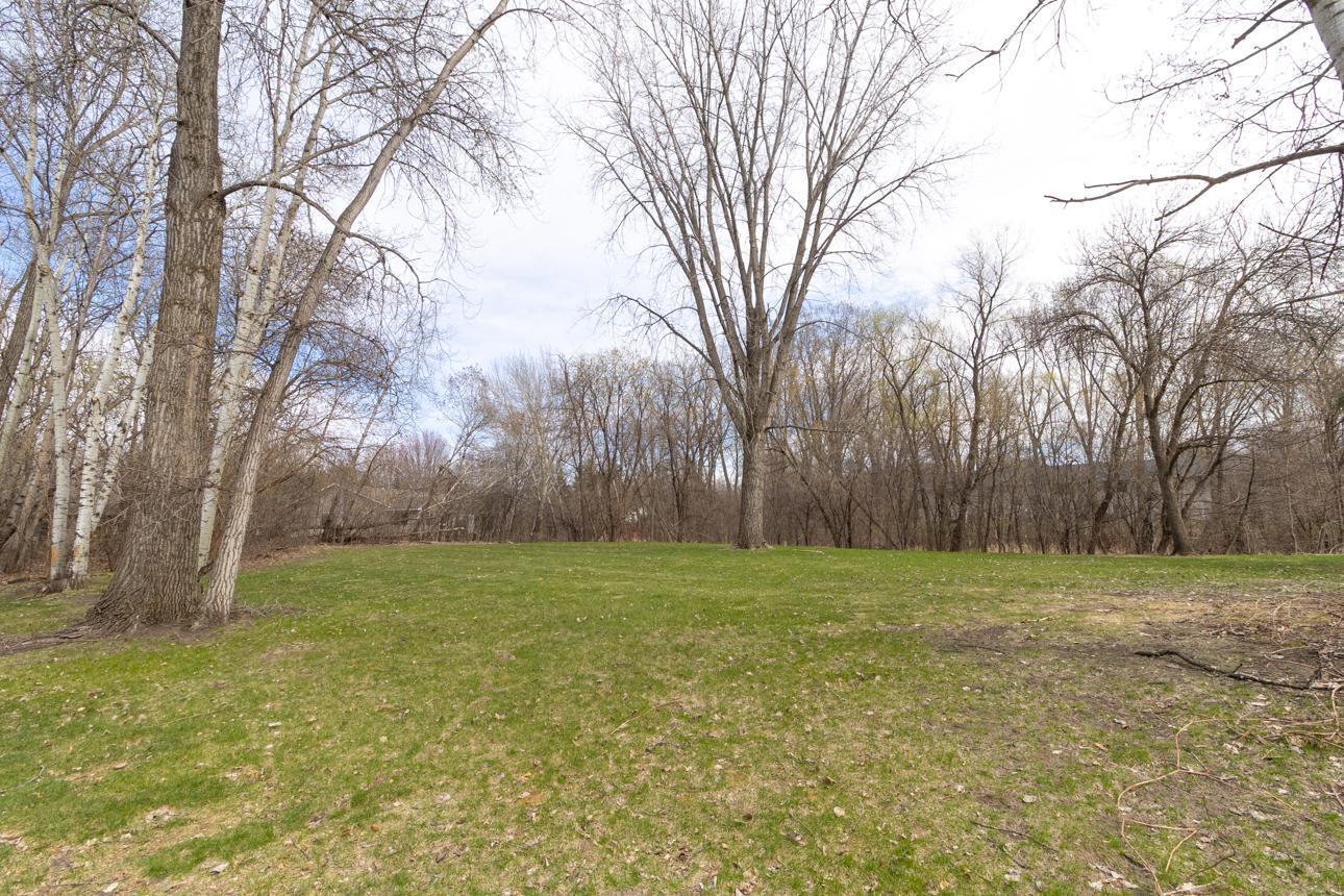 Enjoy the theater of seasons overlooking the woods