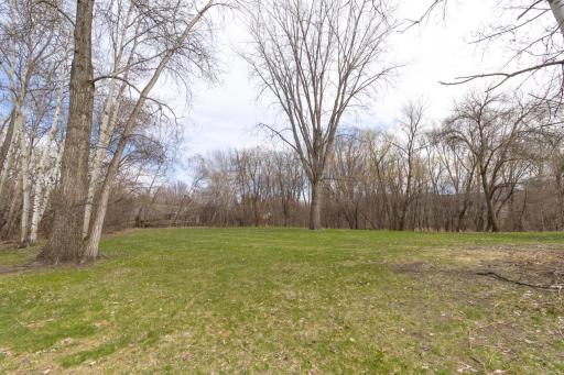 Enjoy the theater of seasons overlooking the woods