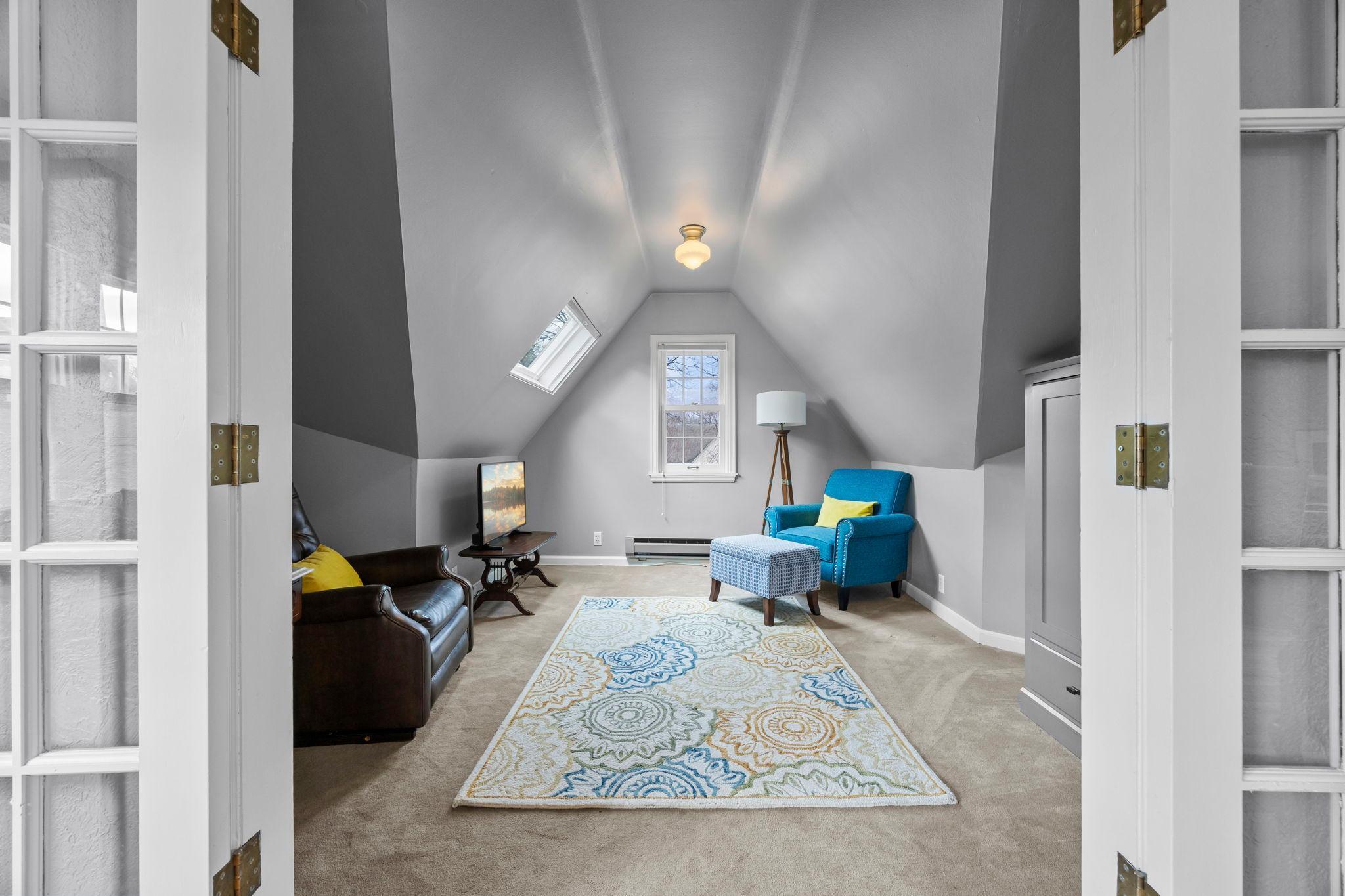 Den or nursery off of the primary bedroom