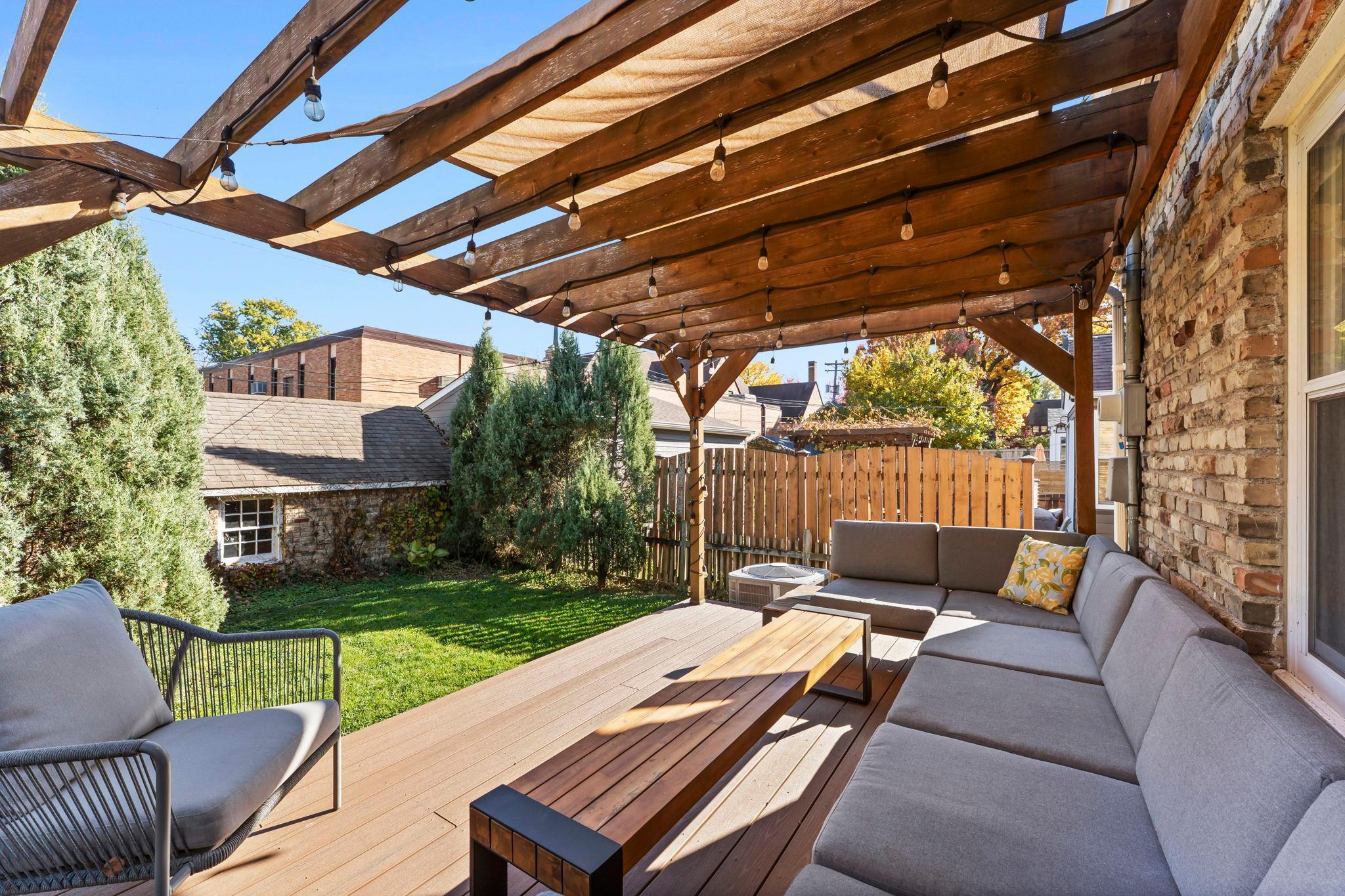 Deck offers outdoor lounging and privacy