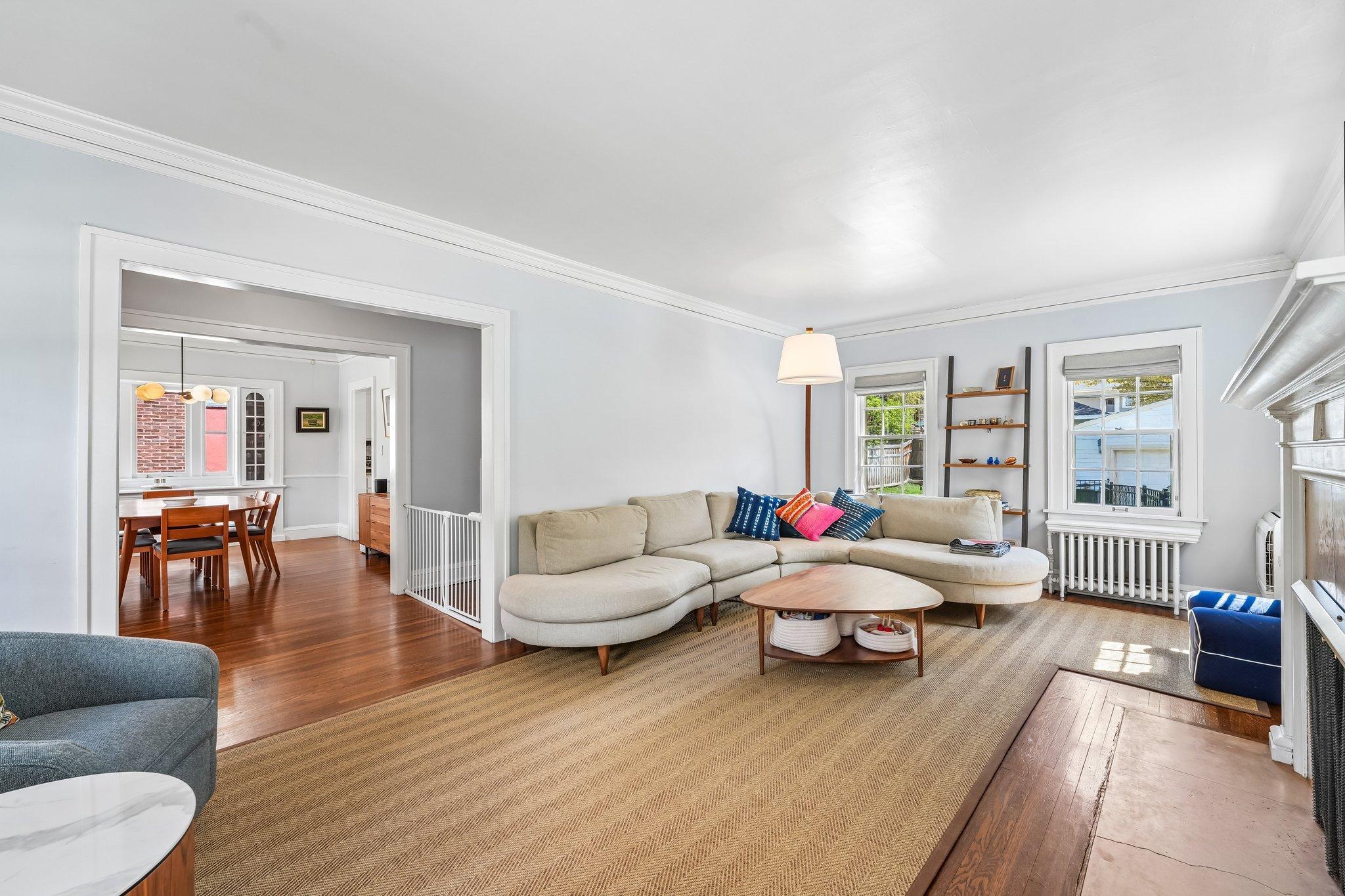 Large livingroom with custom cut rug