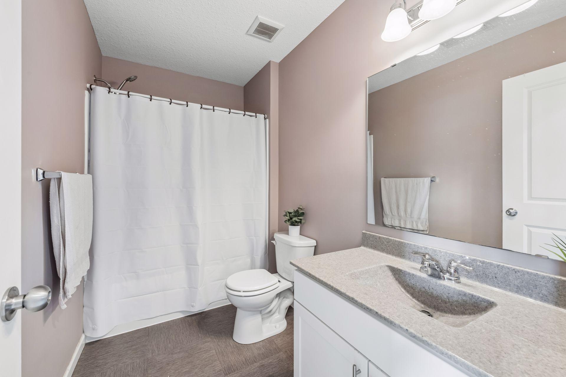 Nicely-located, full bathroom services junior bedrooms