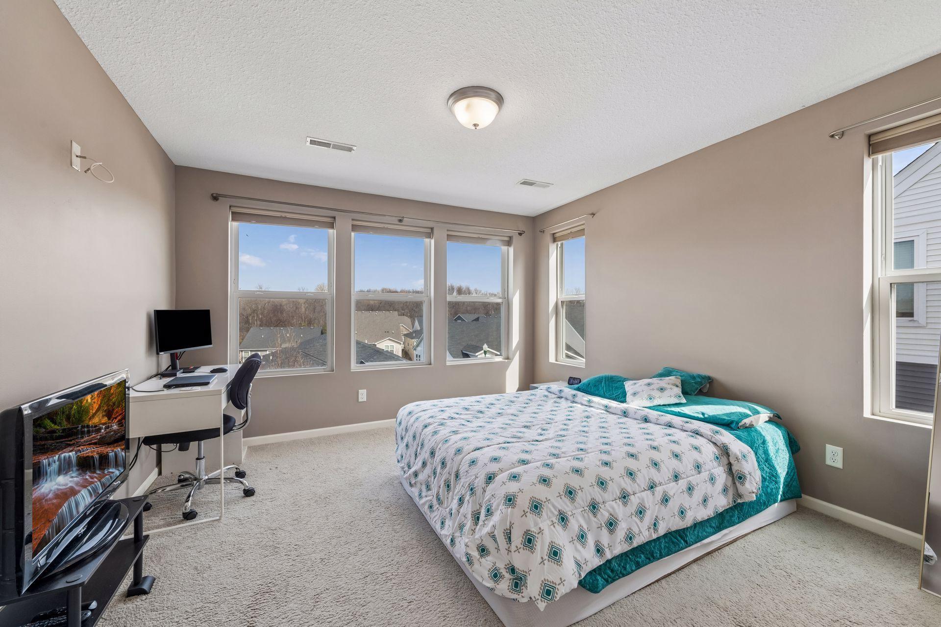 Primary bedroom suite upstairs has wonderful views