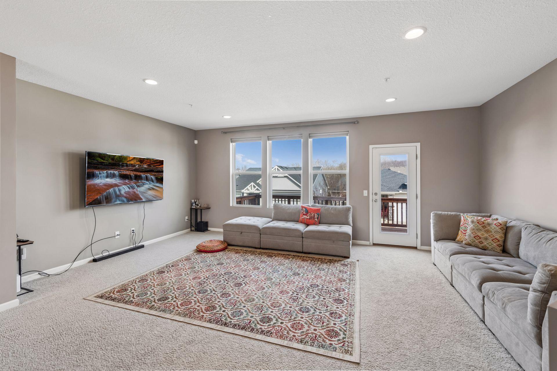 Spacious living room with access to nice deck