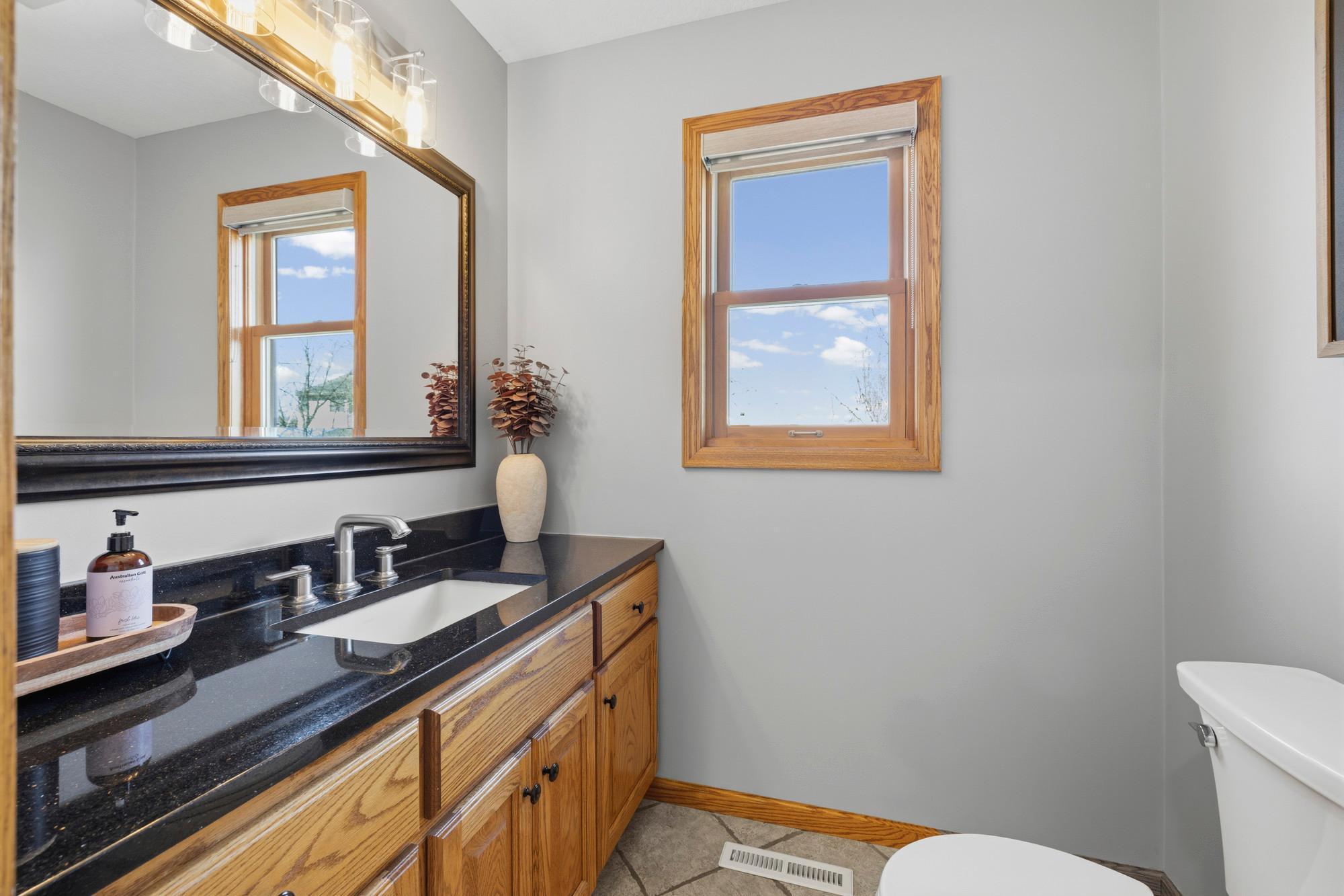 Main Level half bath with upgraded counters