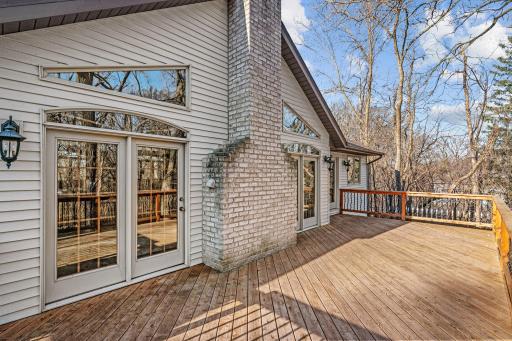 Deck access from living room and primary bedroom