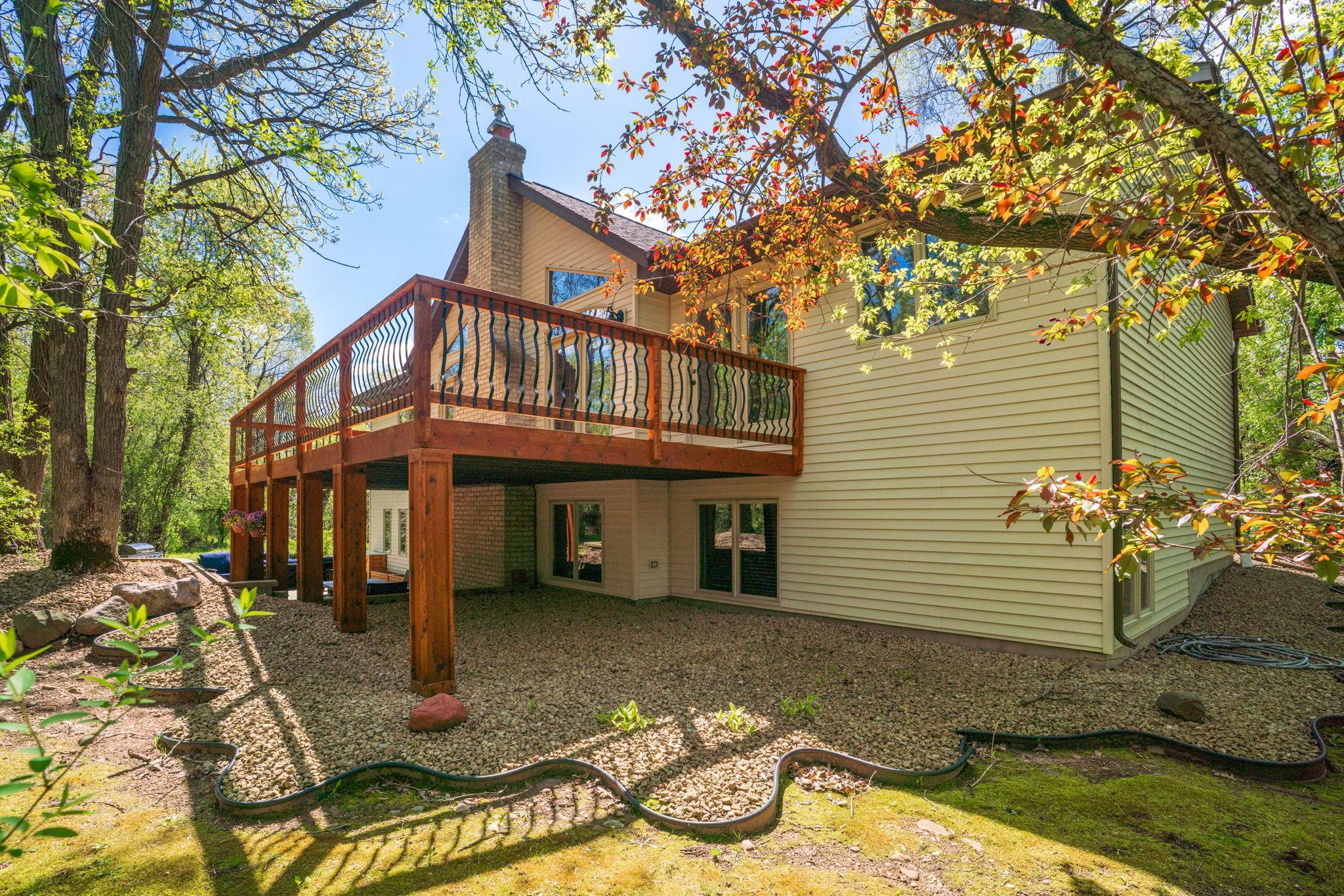 Large deck overlooking the backyard