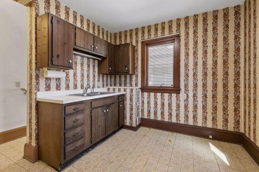 Window for natural light enhances the space, offering a bright setting with great opportunity to update and make it your own.