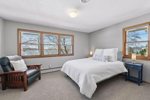 One of three bedrooms on the main level with lake front views