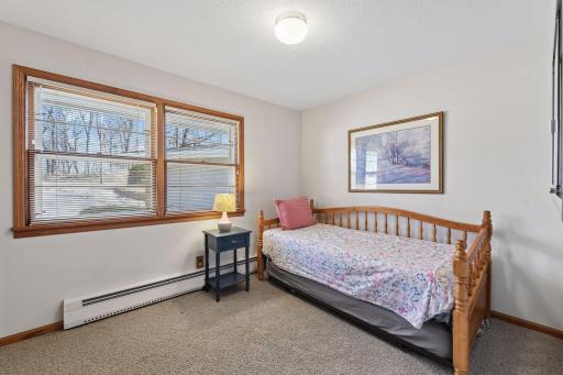 Secondary bedroom on main level perfect for home office or guest space