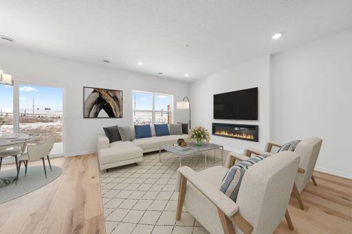 Family Room features electric fireplace and blinds - for illustrative purposes only