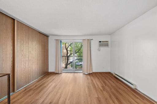 Retreat to your primary suite with large walk-in closet, laundry, and full bathroom.