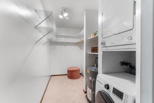 Primary walk-in closet with laundry. Dryer is brand new!