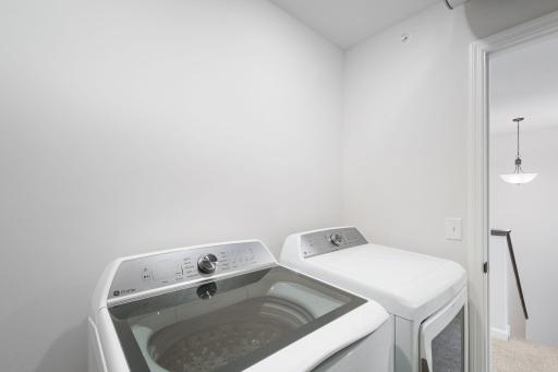 Laundry room features included GE washer and dryer - for illustrative purposes only