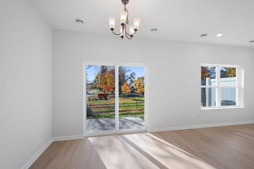 Dining Area features a black light fixture - for illustrative purposes only