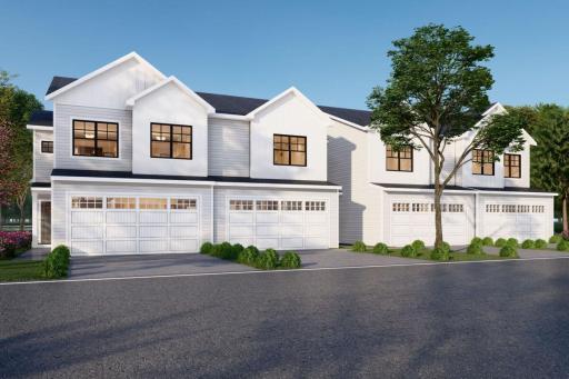 Townhome Exterior - White Siding with Black Accents and Black Windows. Home features grey cabinets, black hardware, shiplap at fireplace wall, blinds, all kitchen appliances included, washer and dryer included.