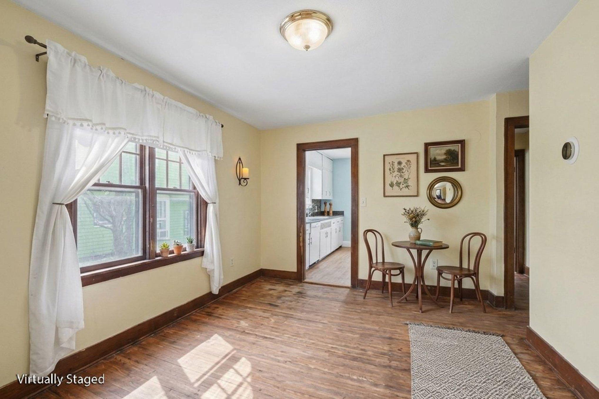 Living room/Dining area (virtually staged to show potential)