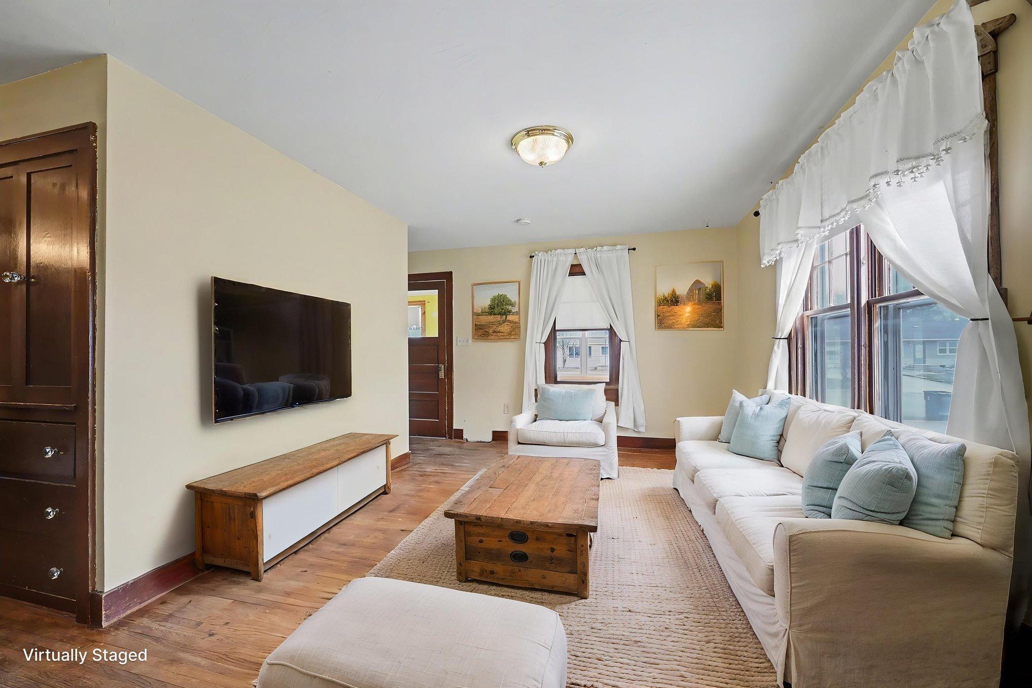 Living room (virtually staged to show potential)
