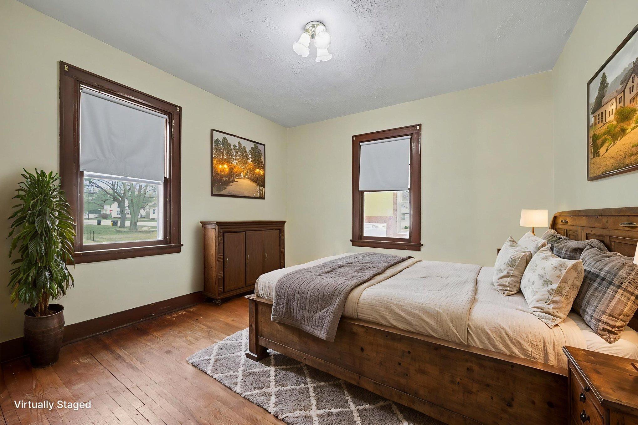 Main Level Bedroom 1 (virtually staged to show potential)