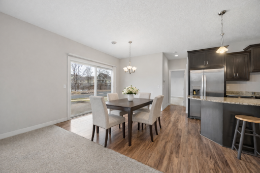 Staged Dining Area, so cute, simple and tasteful. This bright and airy space features a spacious layout, abundant natural light, and modern finishes throughout.