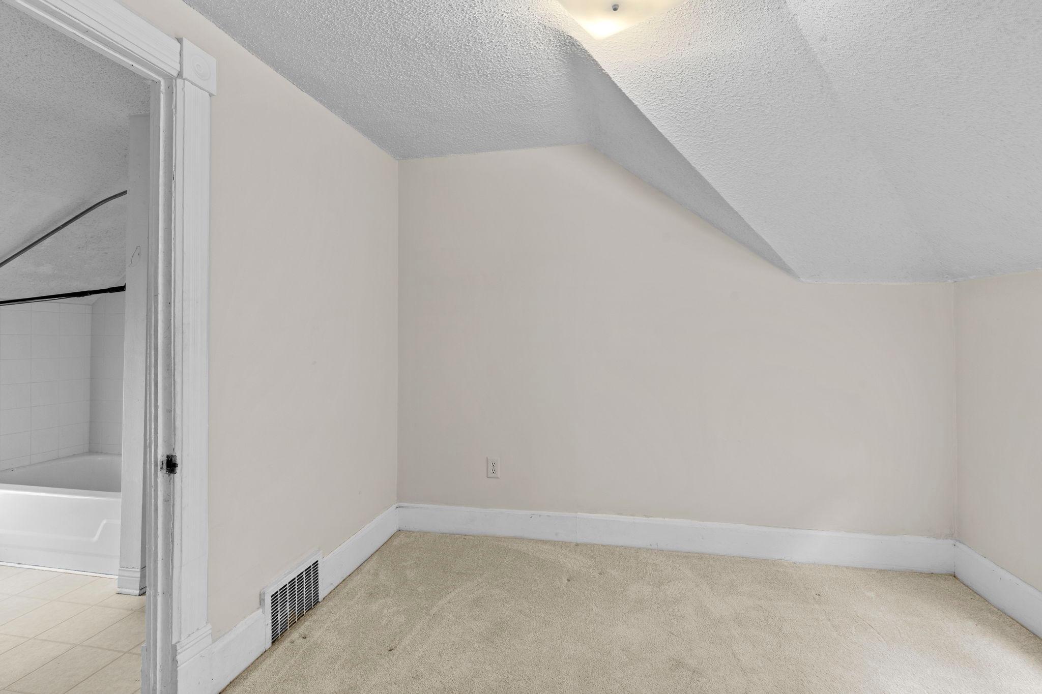Loft space offers versatile flex space—could be used for a home office, media area, or additional lounge