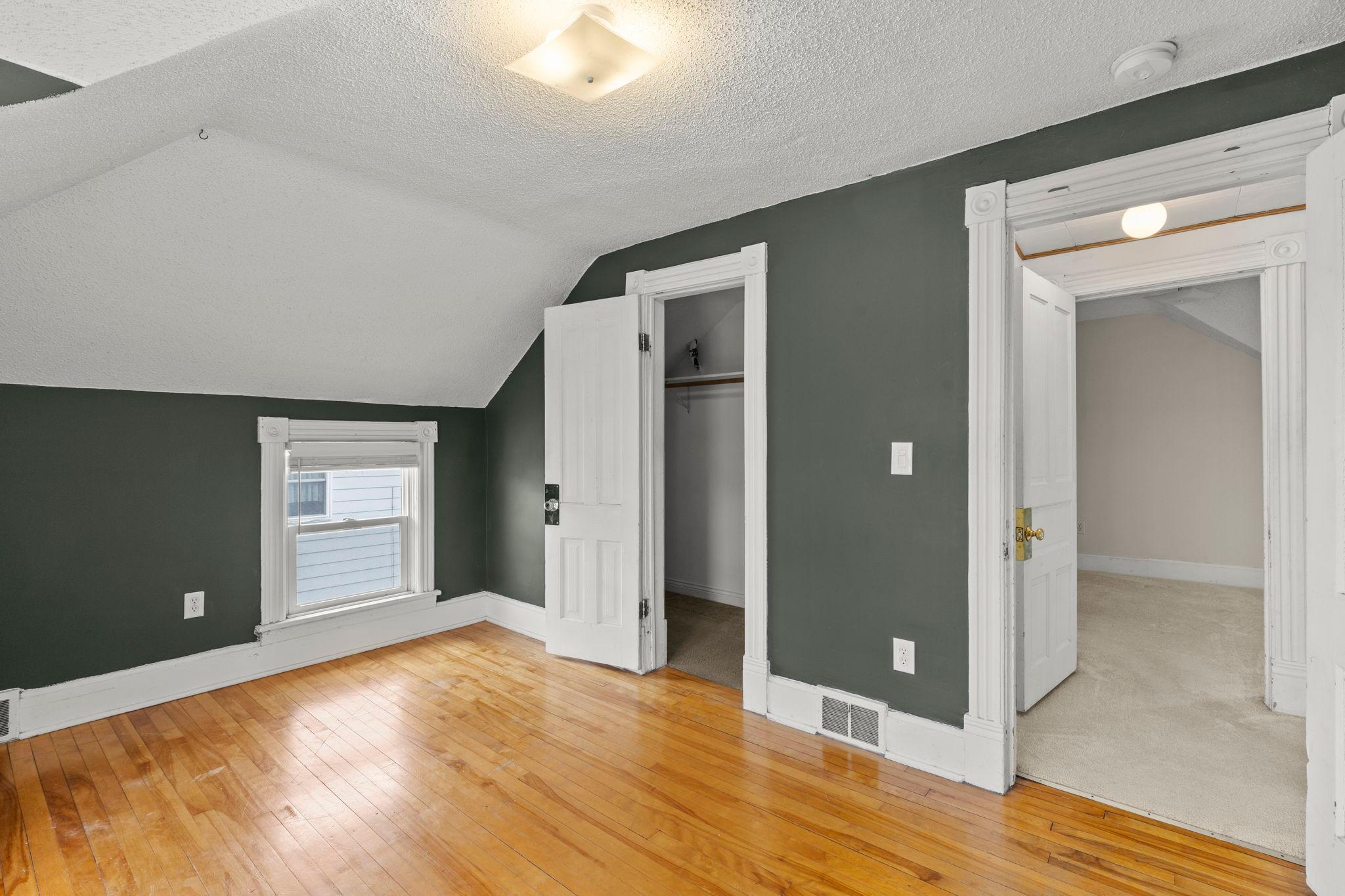 Upper level bedroom walk-in closet