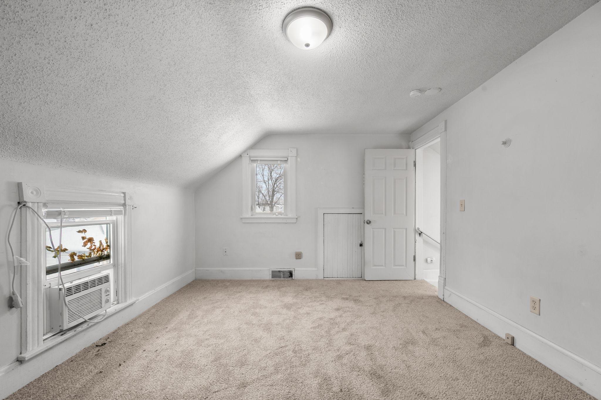 Back unit upper level bedroom 2 with window A/C