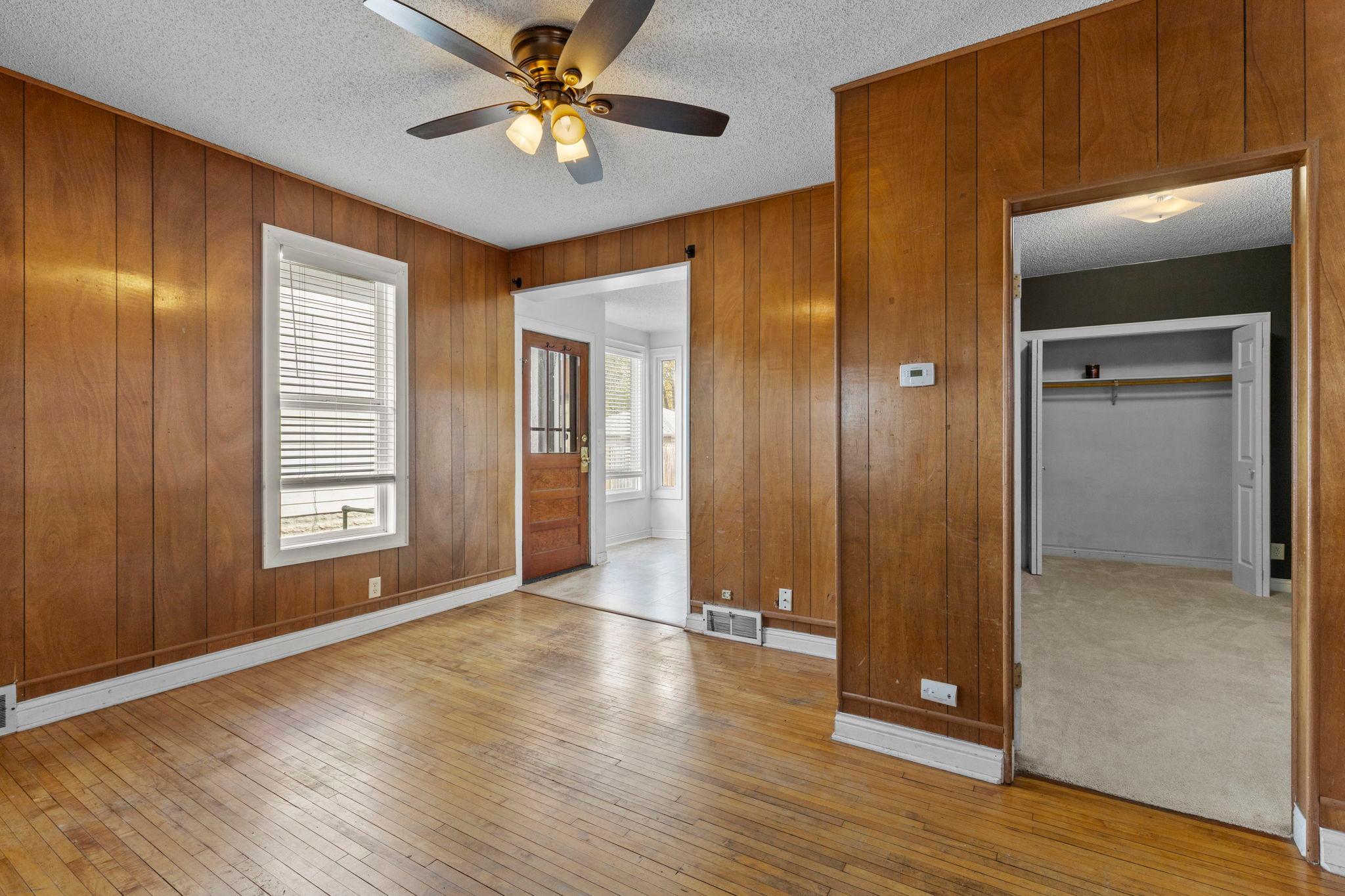 Front unit living room with original hardwood floors