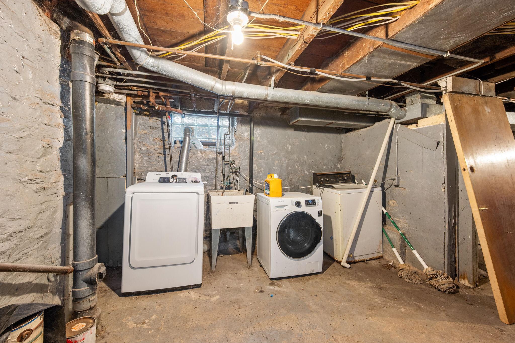 Basement with shared laundry & deep sink - newer washer and dryer